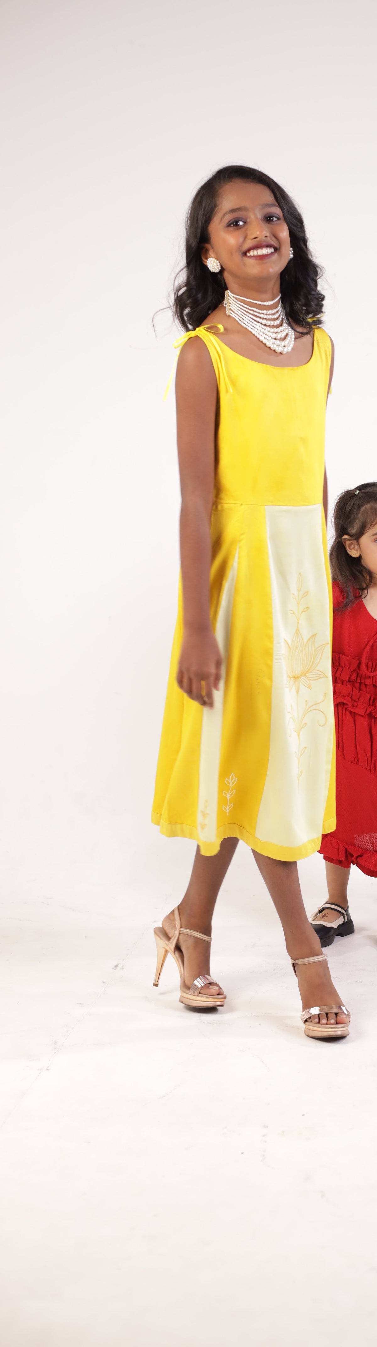 The Yellow Golden Blossom Frock in movement