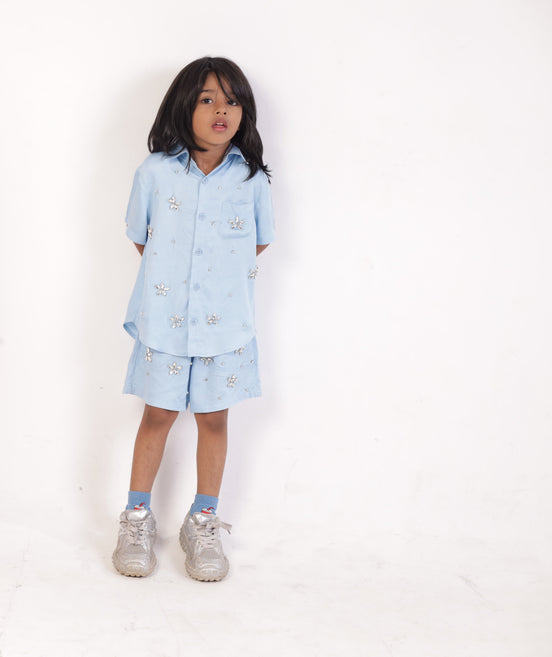 Pale Sky Co-ord by Zouhi — pale blue sugar cane fibre shirt and shorts with hand-set crystal florets, full front view