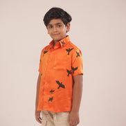 The Sunrise Bird Shirt by Zouhi, full front view on a cream ground, bird print on sugar cane fibre