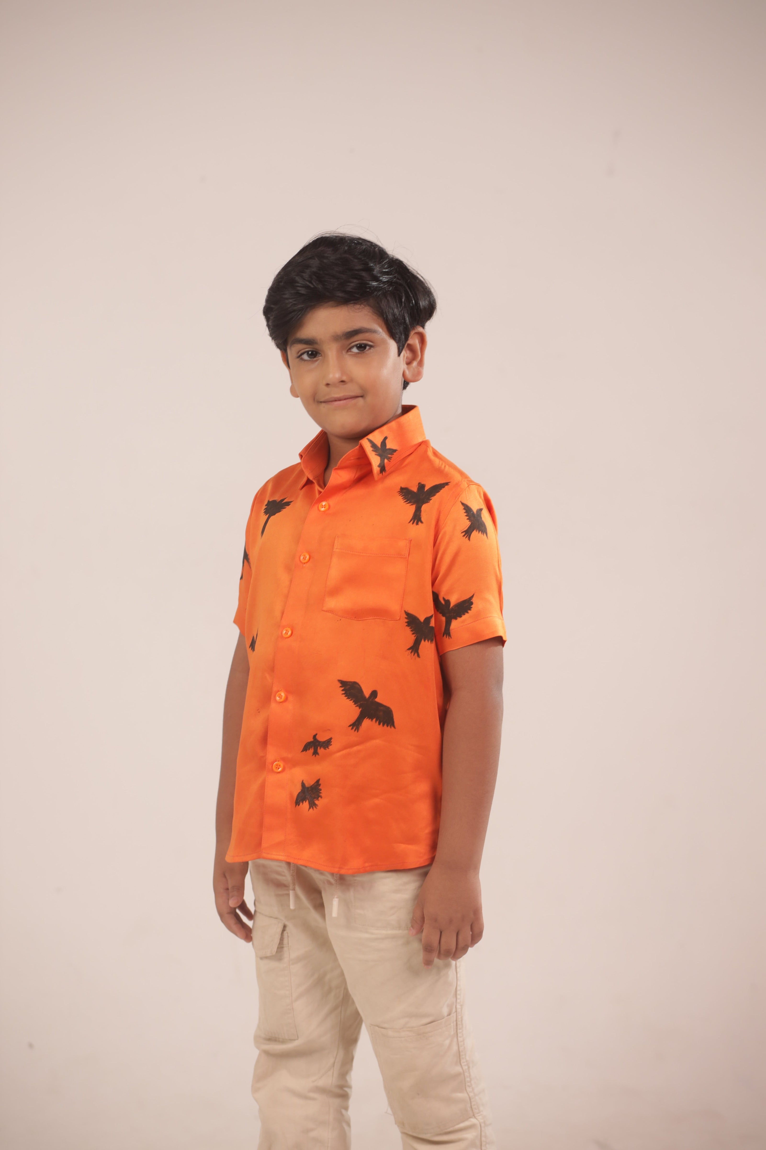 The Sunrise Bird Shirt by Zouhi, full front view on a cream ground, bird print on sugar cane fibre